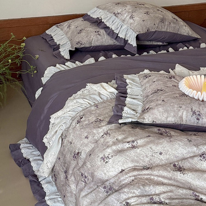 Romantic bed linen set with lace trim, ruffles, and fine floral print