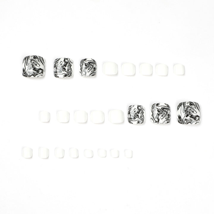 Artful toenail art in elegant marble design Kalsten