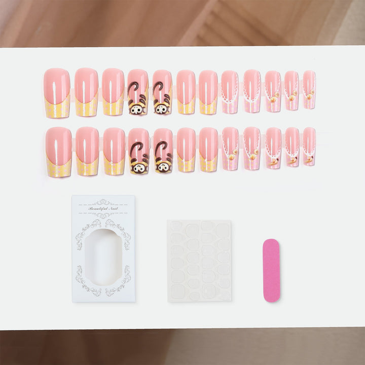Artificial nail set with playful animal motifs and elegant embellishments Kalsten