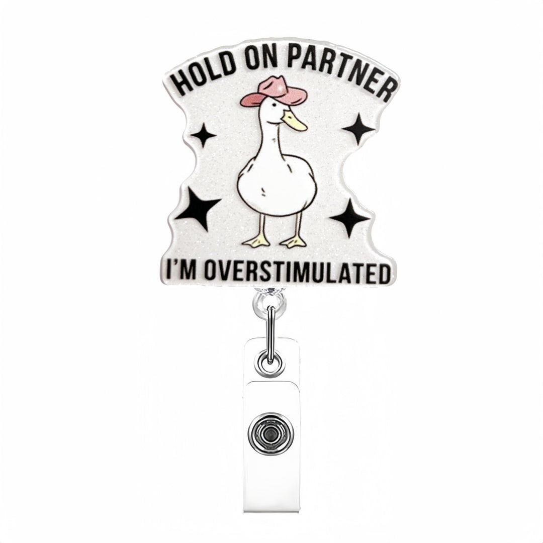 Expandable badge holder with anatomical heart pendant