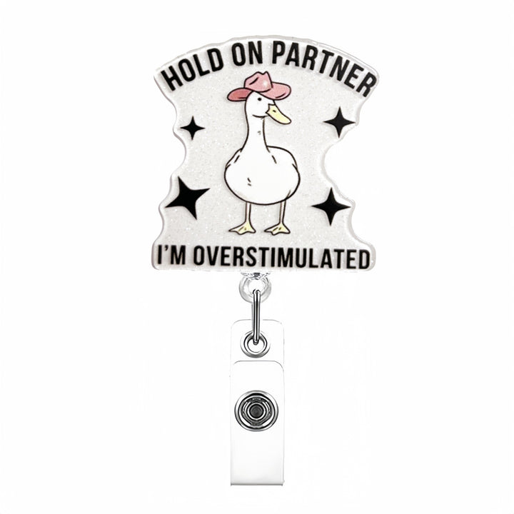 Expandable badge holder with anatomical heart pendant