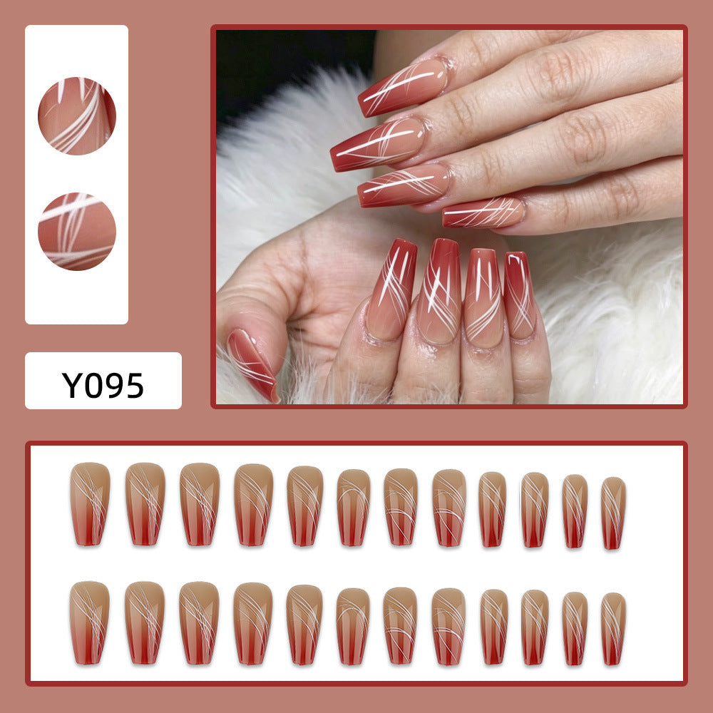 Artificial nails in elegant ombre design with fine lines Kalsten