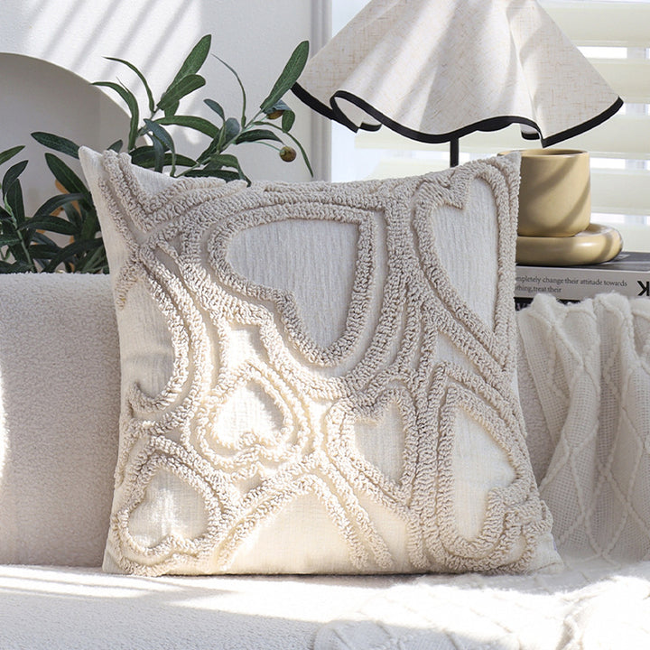 Square cushion cover with three-dimensional looped heart relief made of soft bouclé mix Kalsten