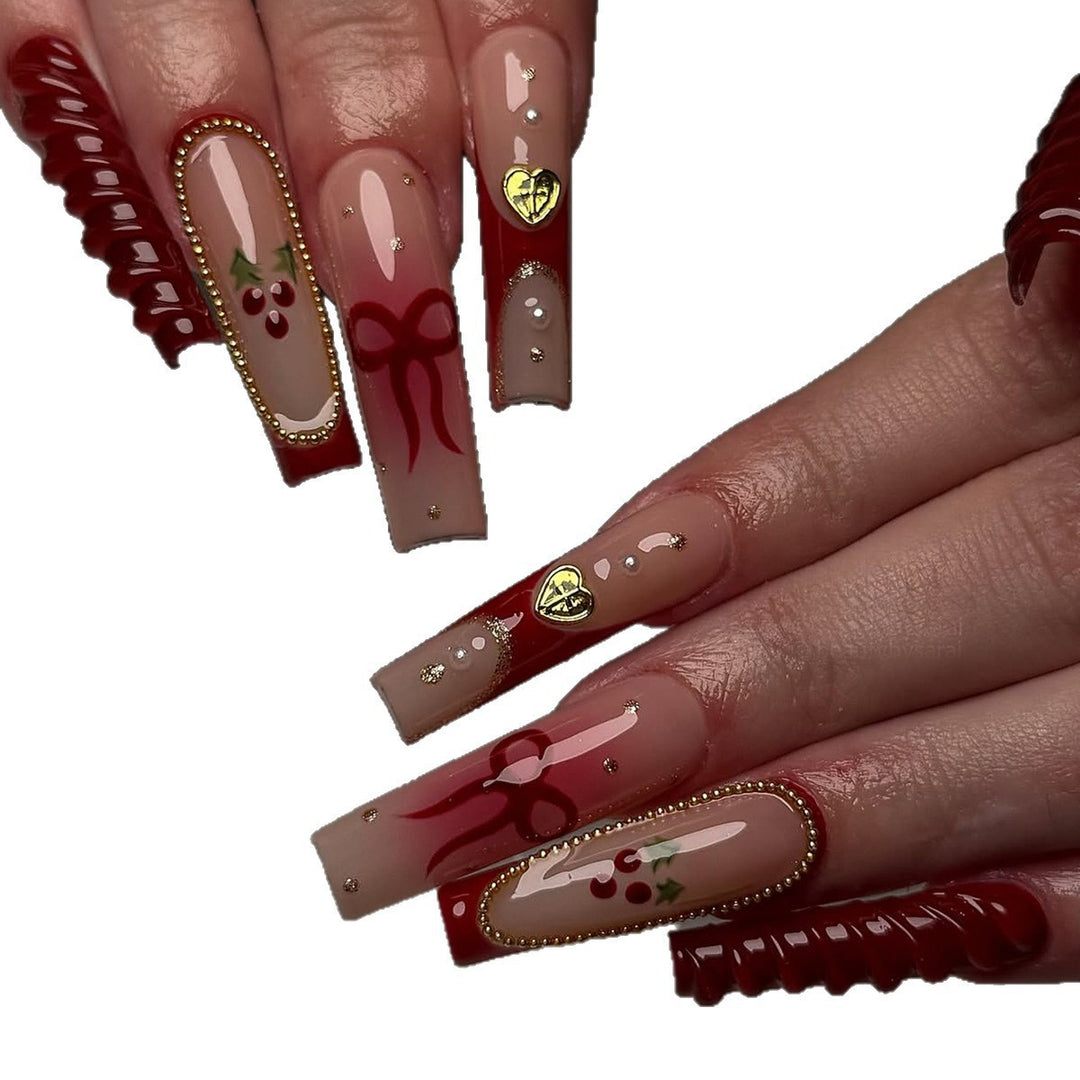 Artificial nail set with festive accents and glitter embellishments Kalsten
