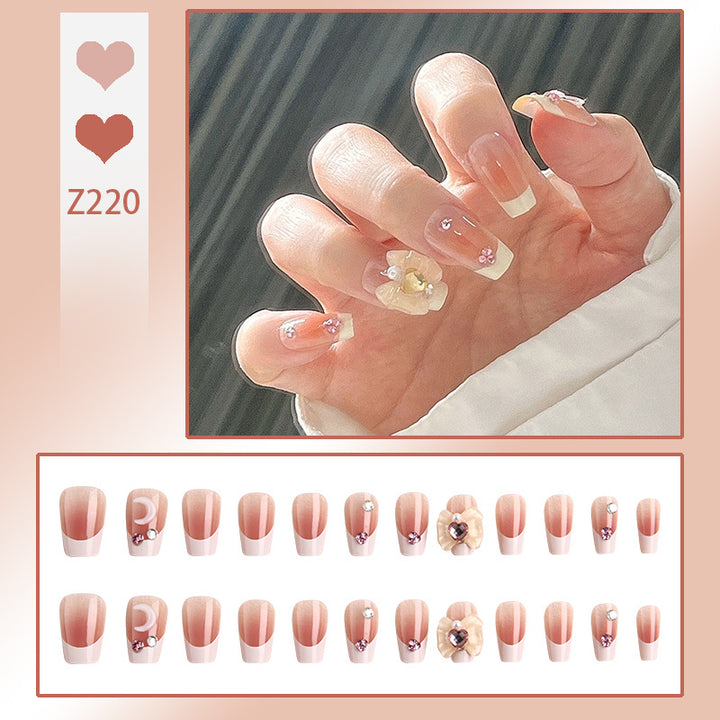 Artificial nail set with elegant floral decorations and glitter accents Kalsten