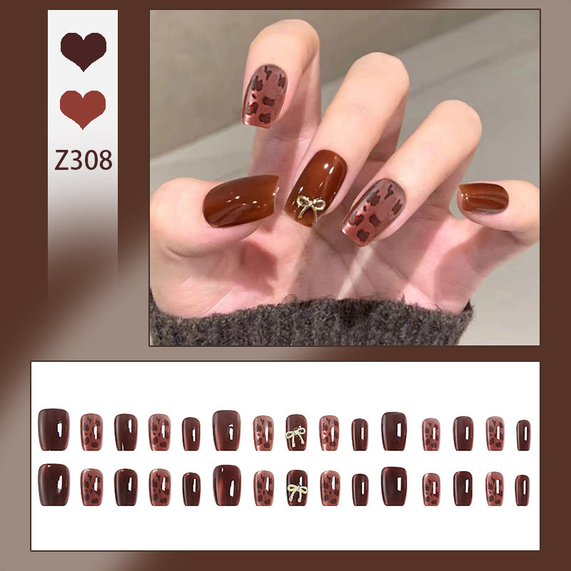 Nail set with elegant leopard pattern and luxurious accents Kalsten
