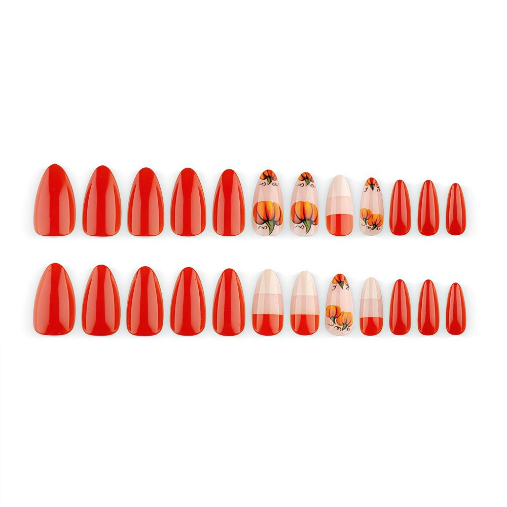 Artificial nails in autumn pumpkin design Kalsten