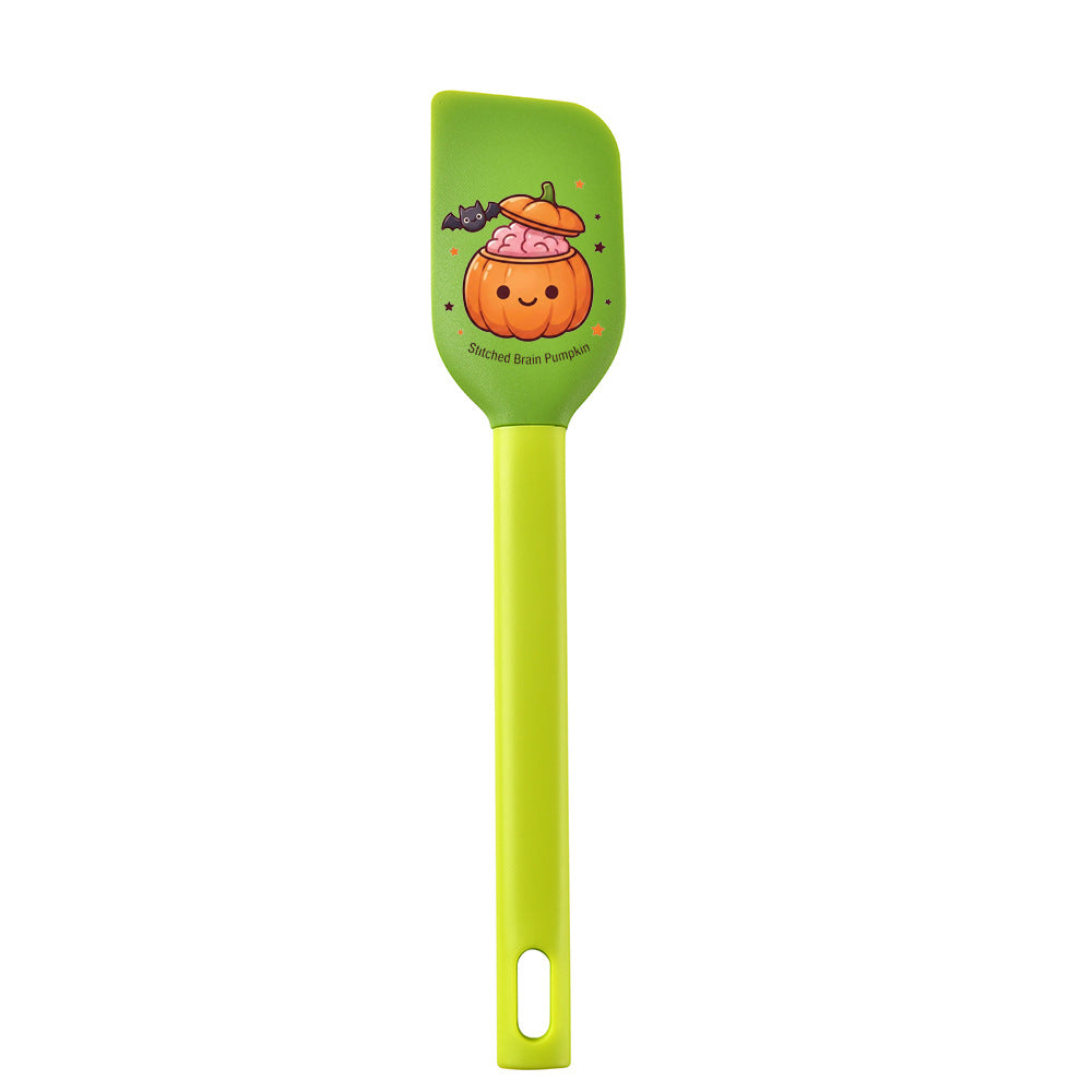 Silicone kitchen spatula with flexible scraper and child-friendly witch motif
