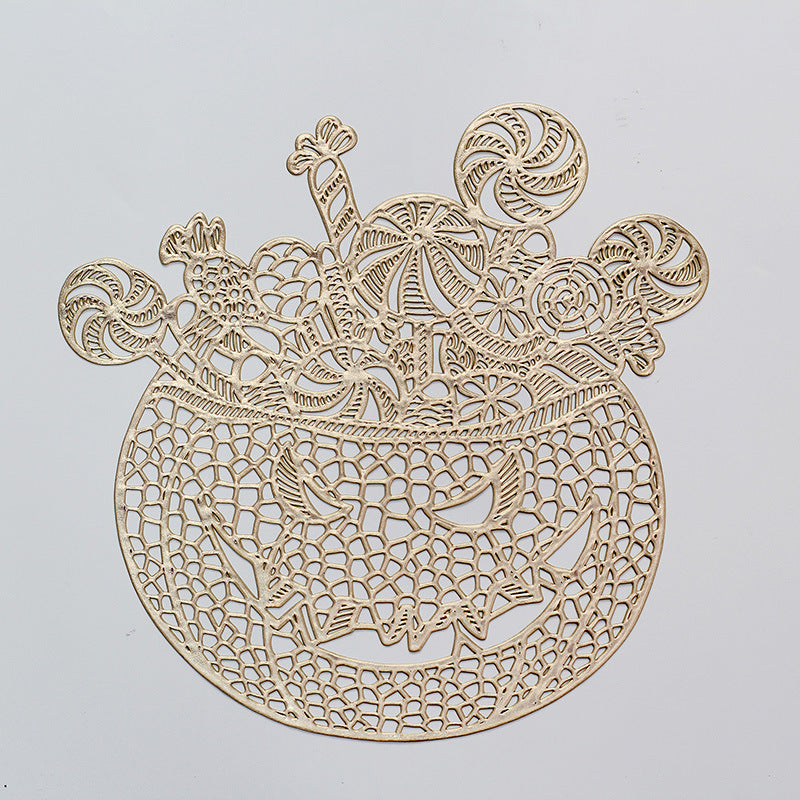 Filigree laser-cut pumpkin placemat made of wood for Halloween table decoration