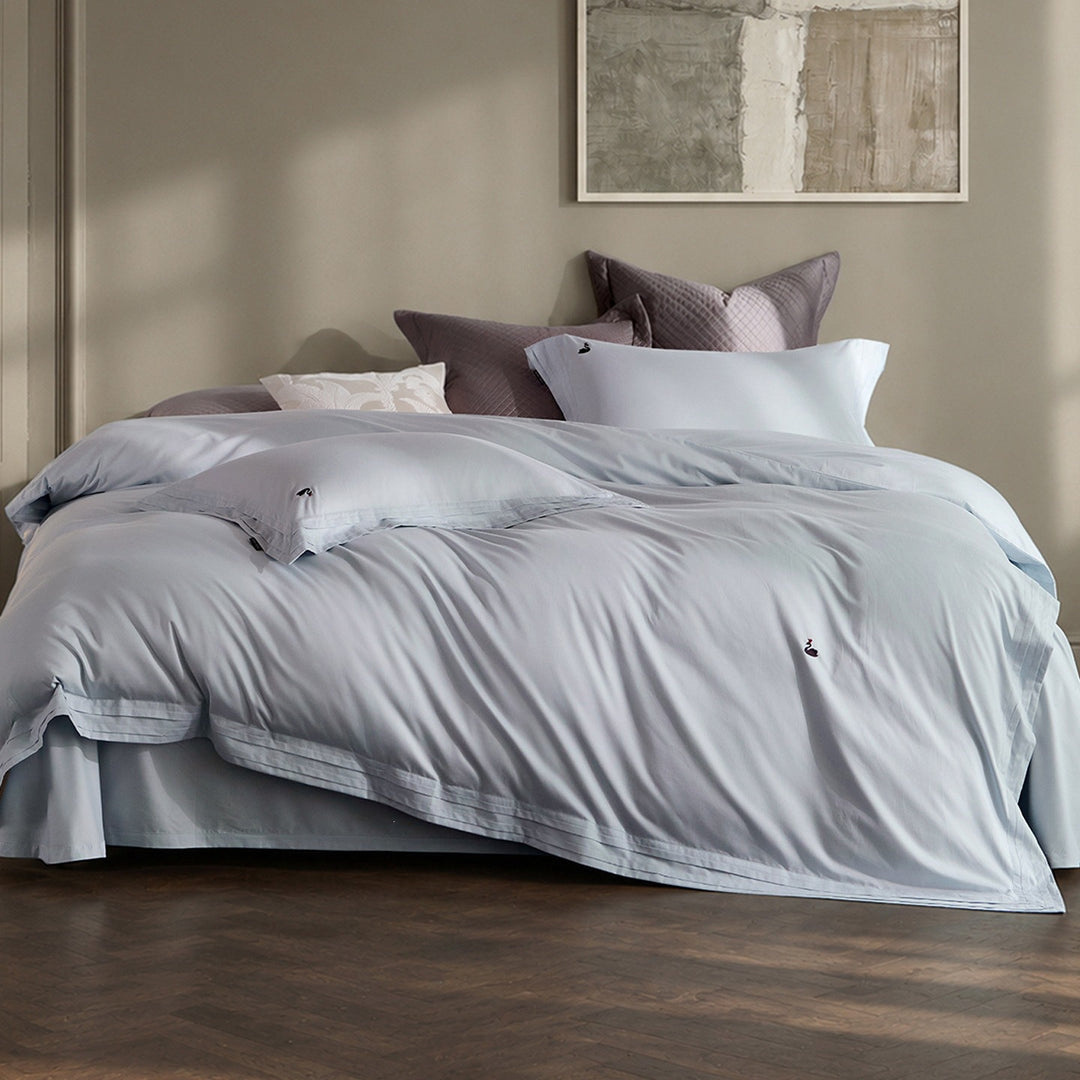 Fine-made duvet cover set made of Mako cotton with subtle monogram embroidery & pleated border