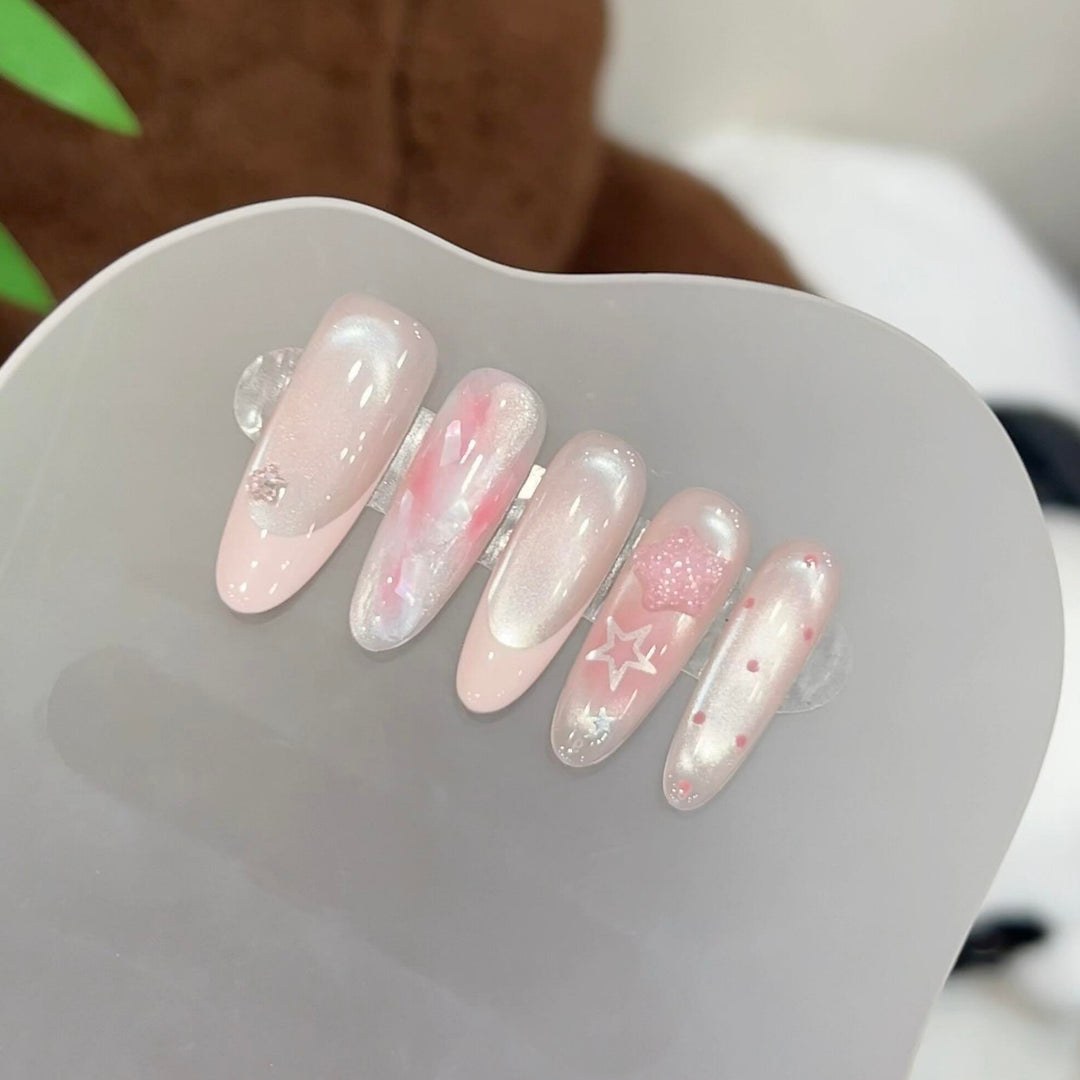 Artificial nails with delicate glitter and star motifs Kalsten