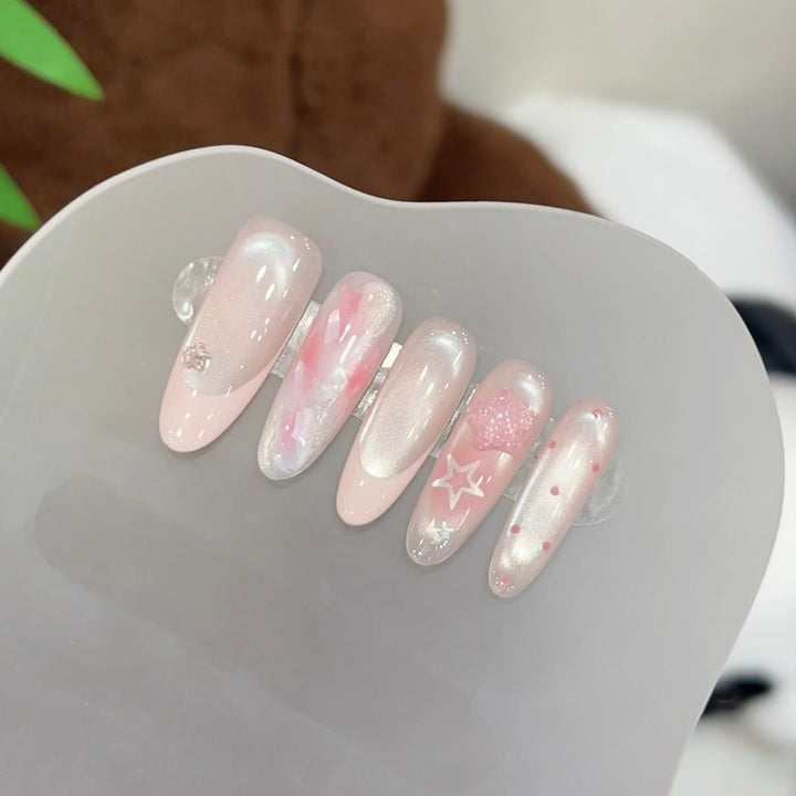 Artificial nails with delicate glitter and star motifs Kalsten