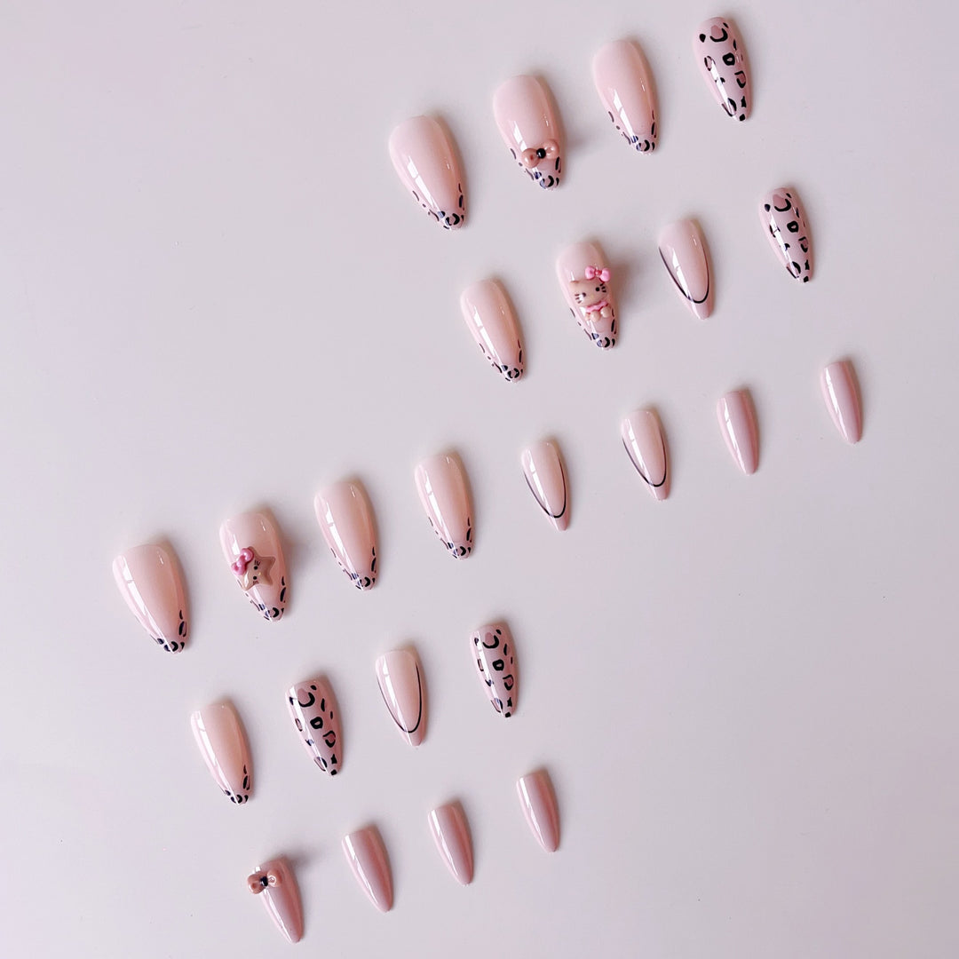 Artificial nail set with playful animal motifs and glitter accents Kalsten