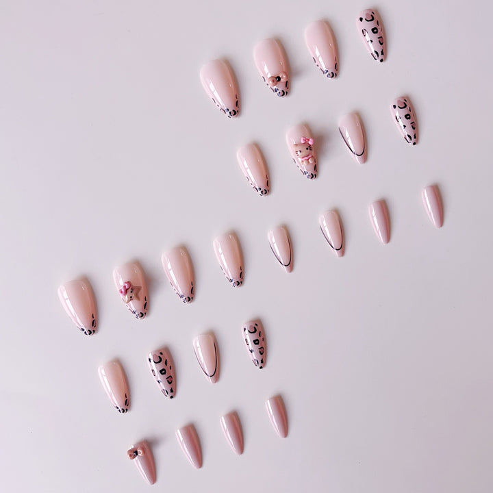 Artificial nail set with playful animal motifs and glitter accents Kalsten