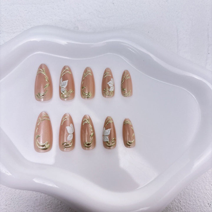 Elegant artificial nails with marble and gold accents Kalsten