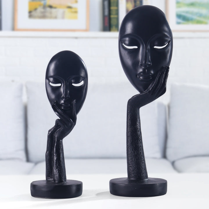 Artful decoration in the form of a thoughtful figure Kalsten