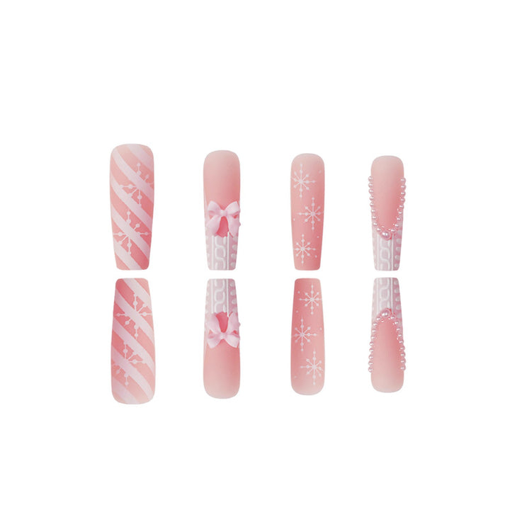 Decorative Press-On Nail Art with Pearl and Bow Accents Kalsten