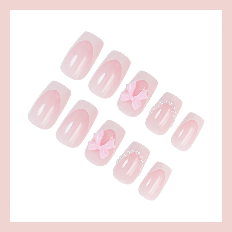 Artifical nail set with romantic bows and elegant accents Kalsten