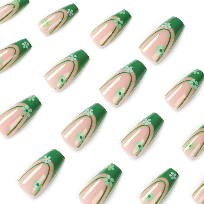 Artful nail art with floral accents and elegant design Kalsten