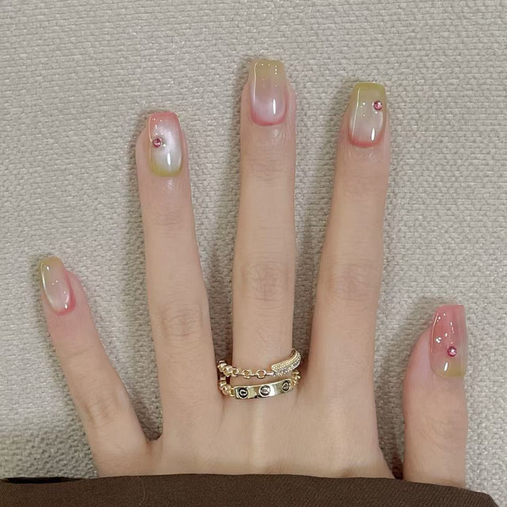 Artificial artificial nails with elegant ombre effects and glitter accents Kalsten