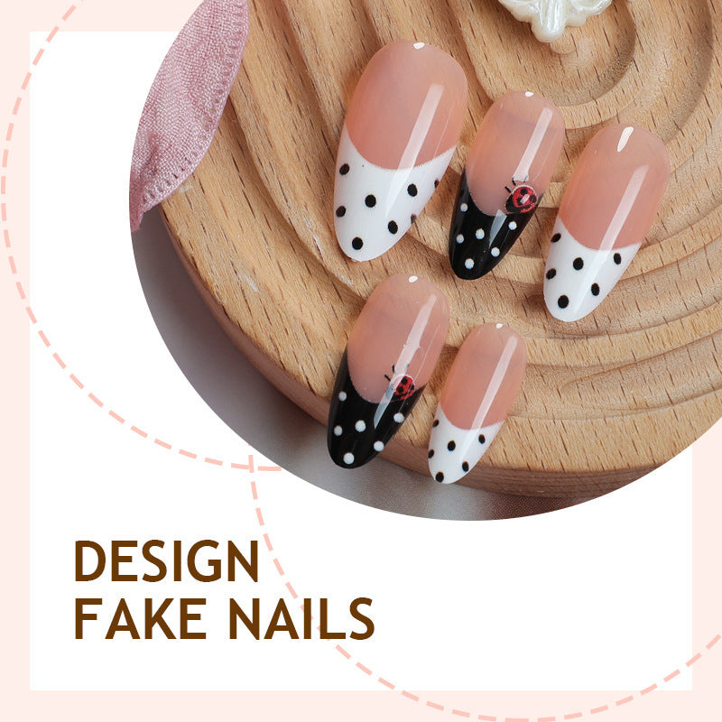 Acrylic nail set with polka-dotted accents and sparkling details Kalsten