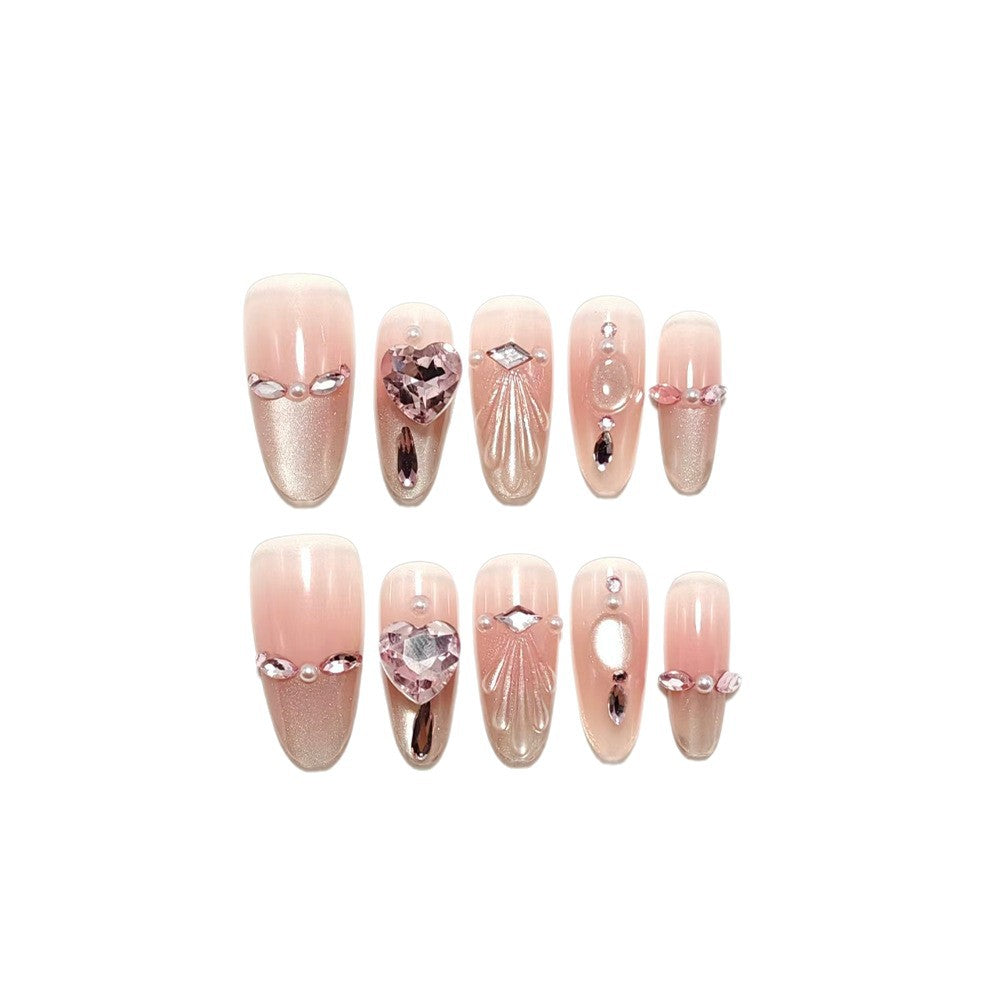 Artificial nails with sparkling heart and rhinestone accents Kalsten