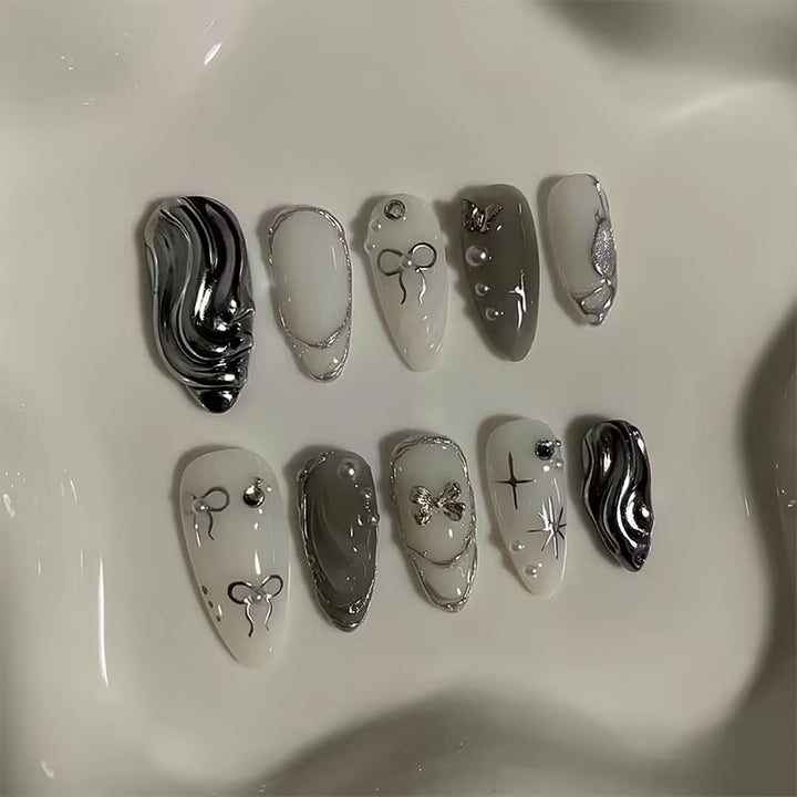 Nail set with luxurious 3D decorations and elegant stone accents Kalsten