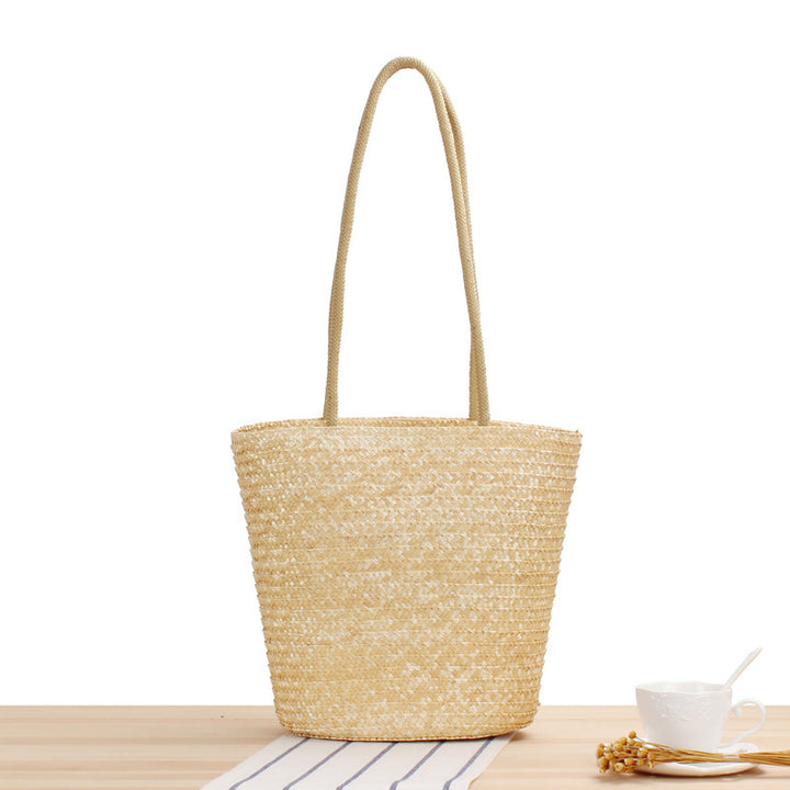 Handcrafted straw bag with long handles Kalsten