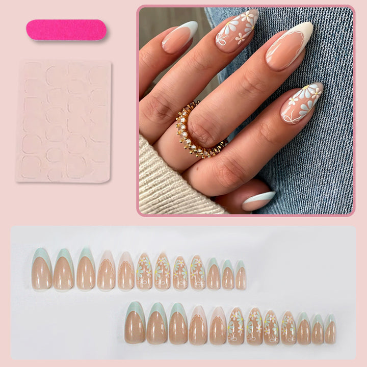 Acrylic nail set with floral accents and elegant tips Kalsten