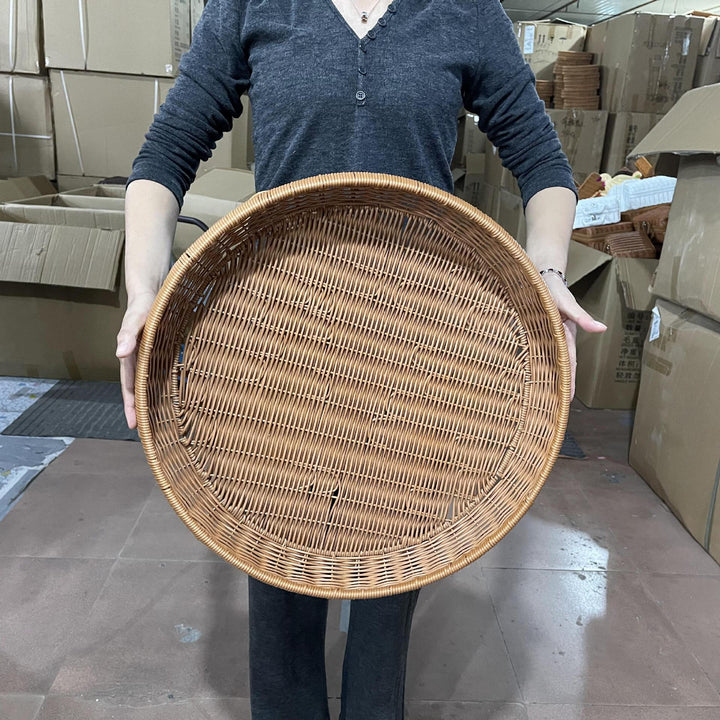 Women’s round serving basket made of woven rattan Kalsten