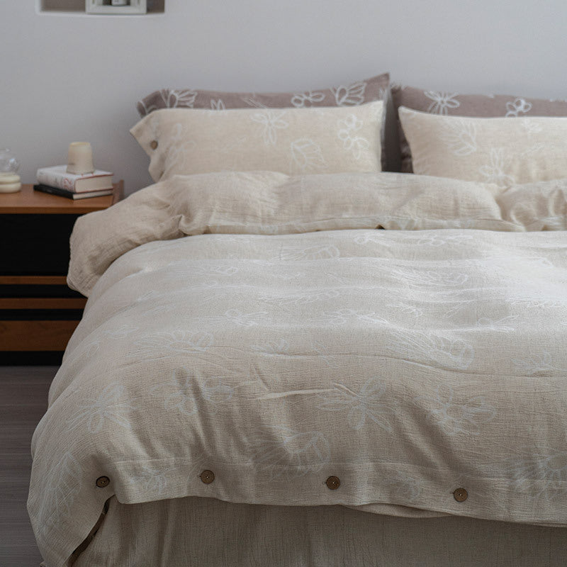 Linen look bedding set with floral print and wooden button closure