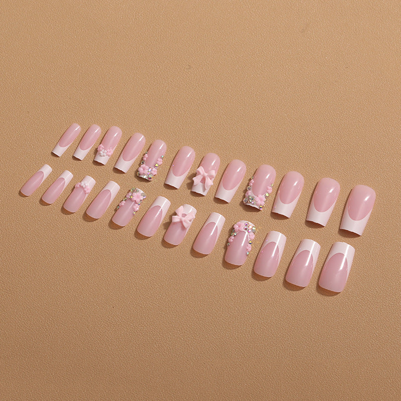 Art nail set with floral 3D accents and glitter decorations Kalsten