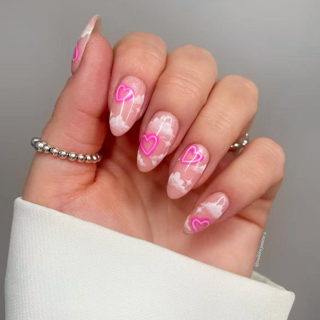 Artificial nail set with romantic heart accents and sparkling finish Kalsten