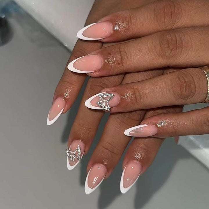 Artificial nail set with elegant French design and rhinestone-embellished accents Kalsten