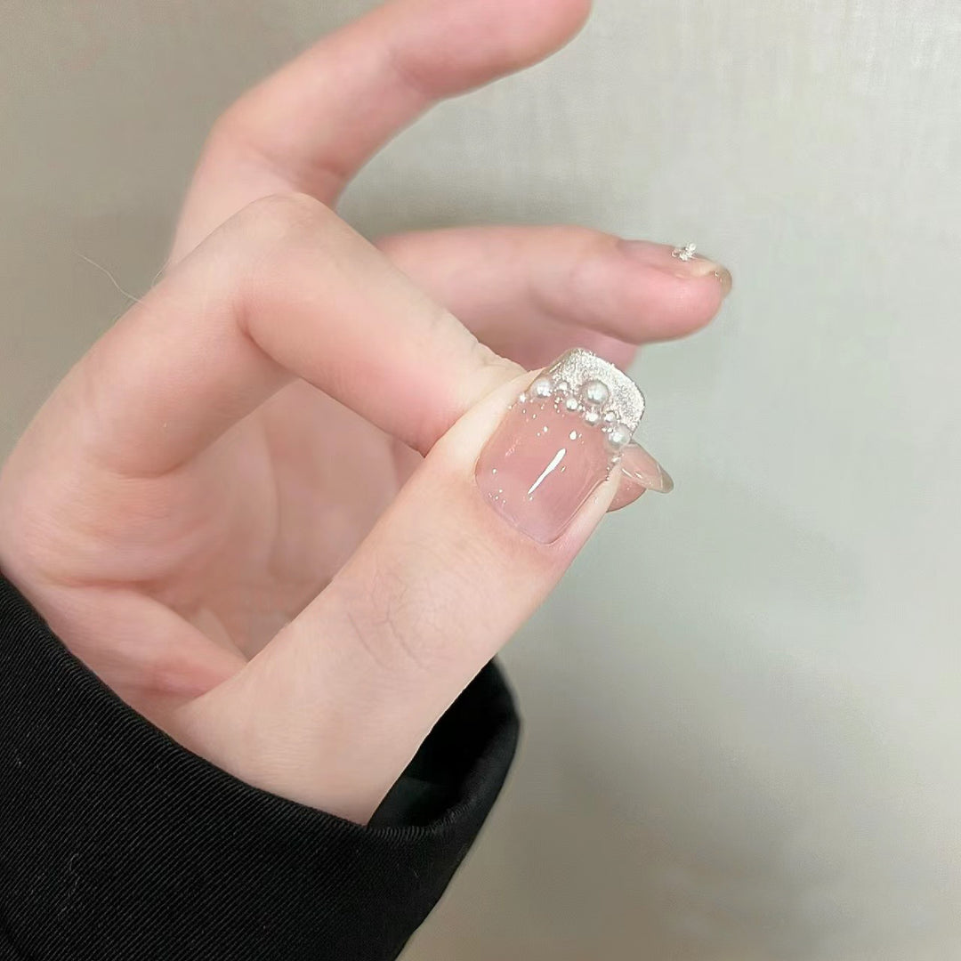 Elegant artificial nails with pearl decorations and glitter effects Kalsten