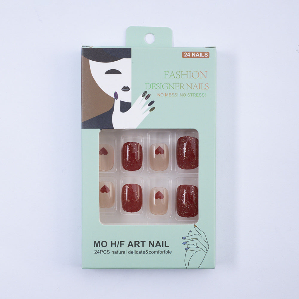 Art nail set with heart designs and glitter Kalsten
