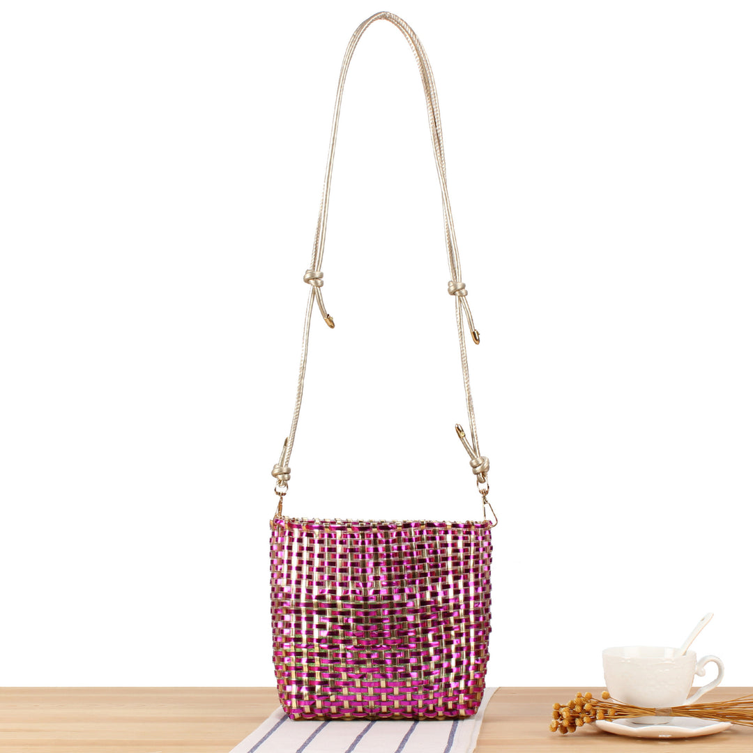 Shoulder bag made of handwoven synthetic material with fashionable sliding mechanism Kalsten