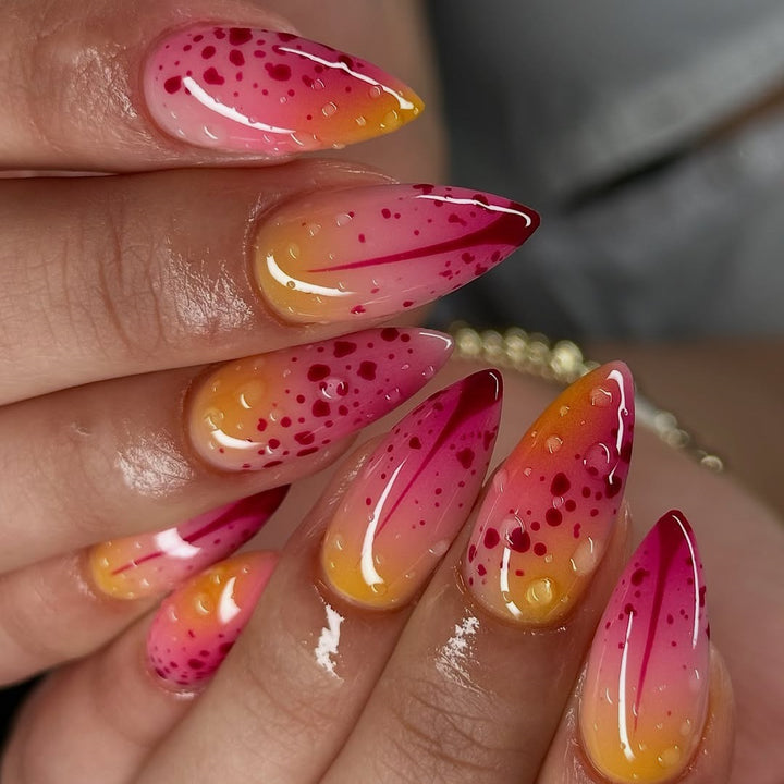 Creative artificial nails with appealing ombre and glitter effects Kalsten