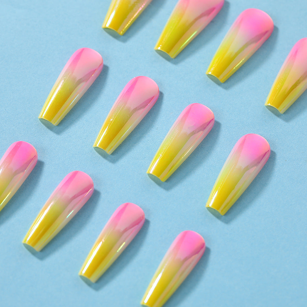 Artificial nail tips in modern ombre design Kalsten
