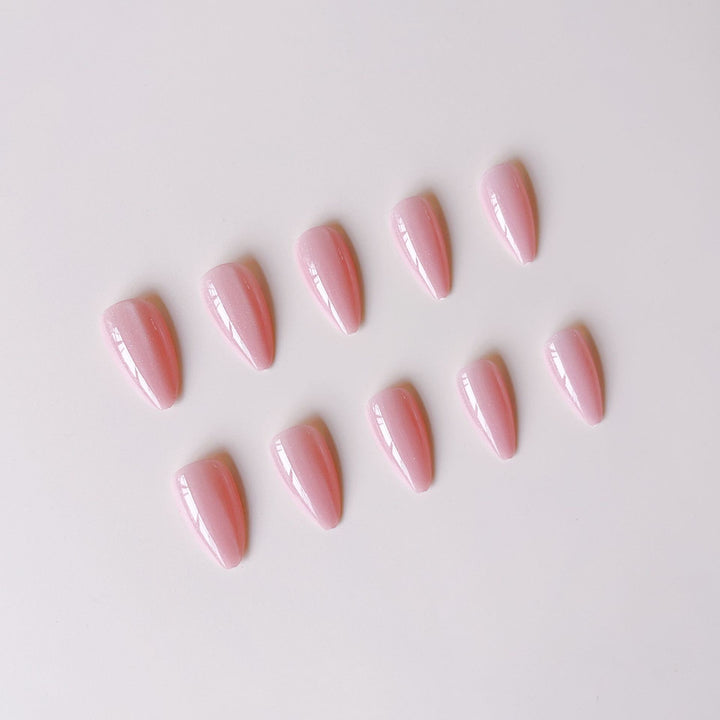 Acrylic nail set with glamorous high-gloss finish and delicate glitter accents Kalsten