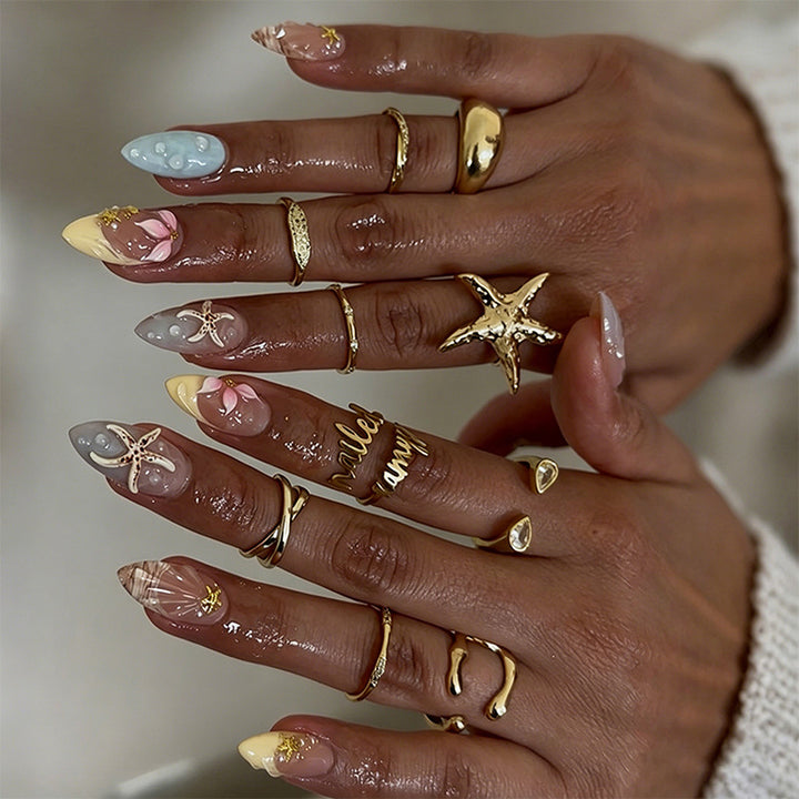 Artificial nails with floral motifs and glitter details Kalsten