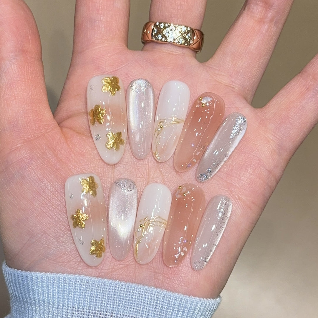 Artificial nails with floral decorations and glitter effects Kalsten