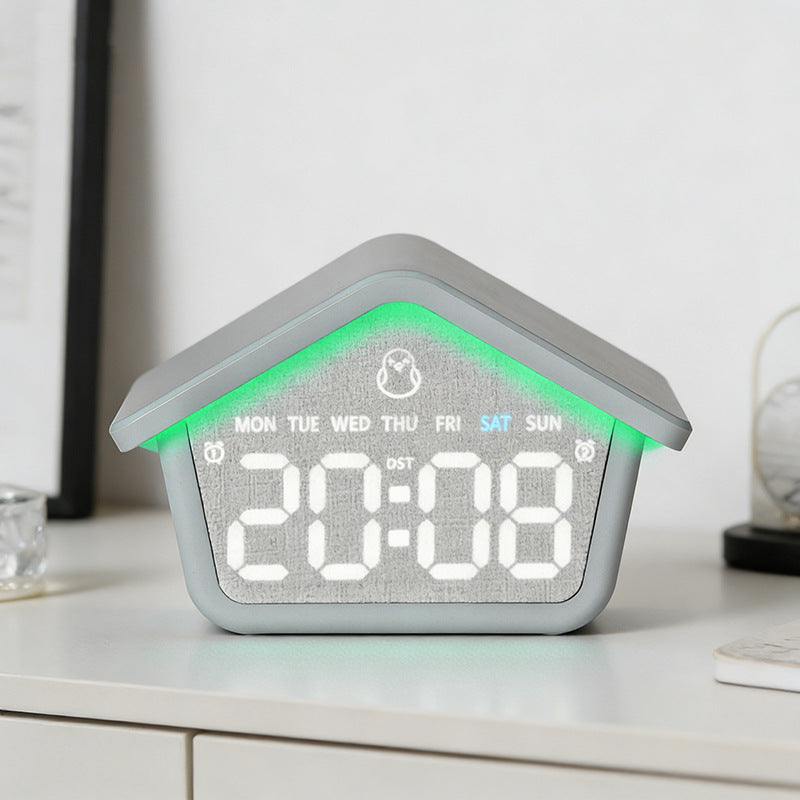 Digital alarm clock in creative house design Kalsten