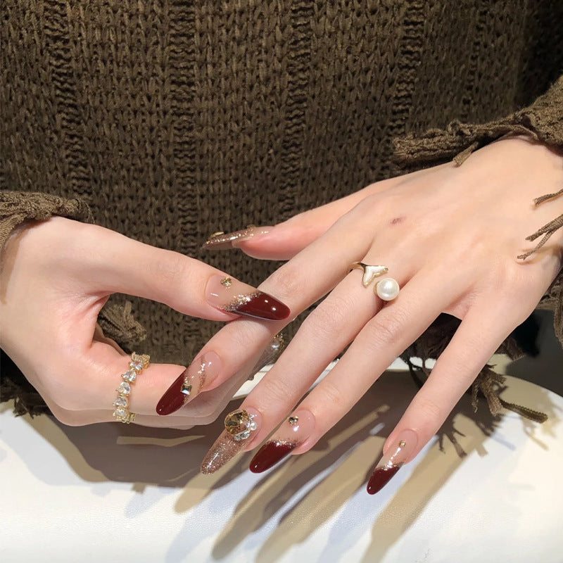 Acrylic nail set with elegant glitter design and exclusive embellishments Kalsten