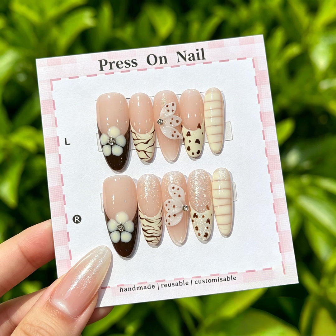 Artistic Press-On Nail Set with Floral and Patterned Designs