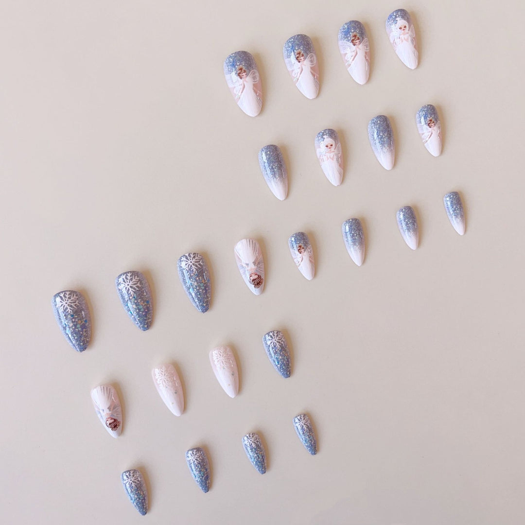 Nail art set with enchanting fairy motifs and glitter accents Kalsten