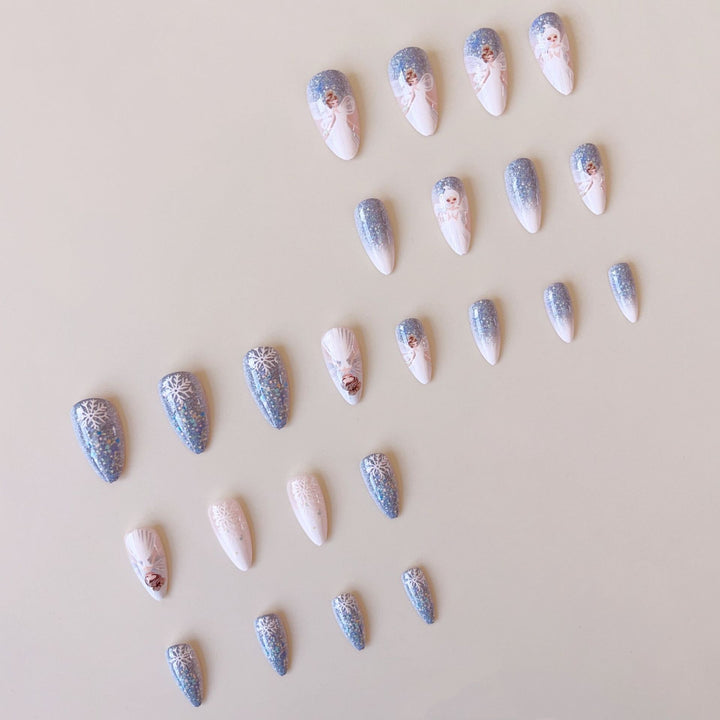 Nail art set with enchanting fairy motifs and glitter accents Kalsten