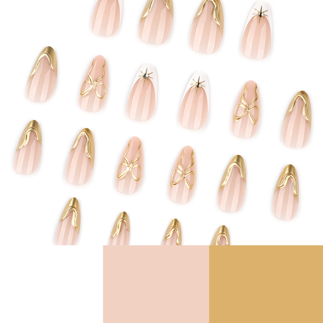 Artistic stiletto nails with elegant gold accents Kalsten