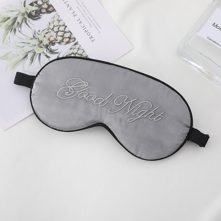 Unisex embroidered contoured sleep mask with decorative text embroidery and adjustable elastic band Kalsten