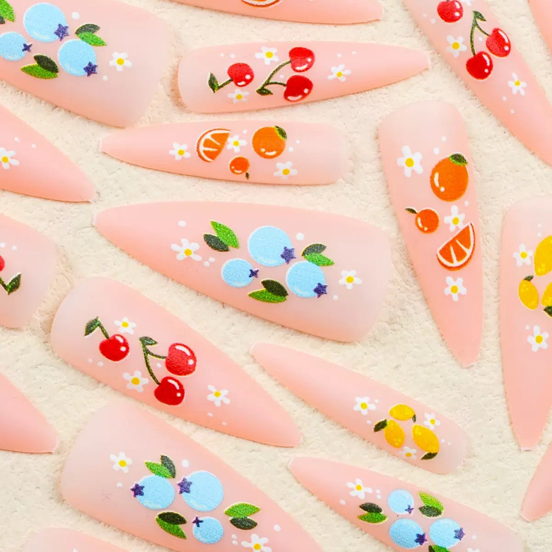 Artificial nail set with fruity 3D designs and blooming accents Kalsten